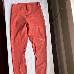 Salmon colored Lululemon Leggings